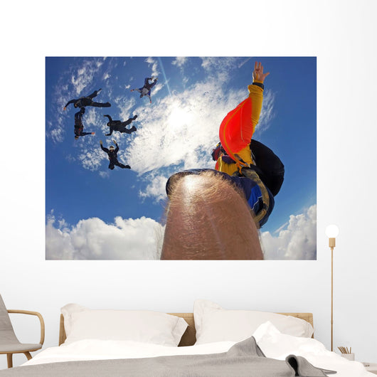 Point of view of a camera attached in the leg of the skydiver Wall Mural
