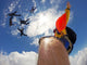 Point of view of a camera attached in the leg of the skydiver Wall Mural