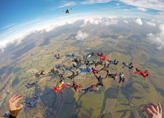 Skydiving people team work Wall Mural