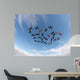 Skydiving people low angle view Wall Mural