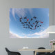 Skydiving people low angle view Wall Mural