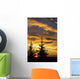 Silhouette of two evergreen trees, sunrise Wall Mural