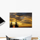 Silhouette of two evergreen trees, sunrise Wall Mural