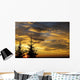 Silhouette of two evergreen trees, sunrise Wall Mural