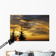 Silhouette of two evergreen trees, sunrise Wall Mural
