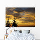 Silhouette of two evergreen trees, sunrise Wall Mural