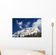 Snow covered mountain peak, blue sky, clouds Wall Mural