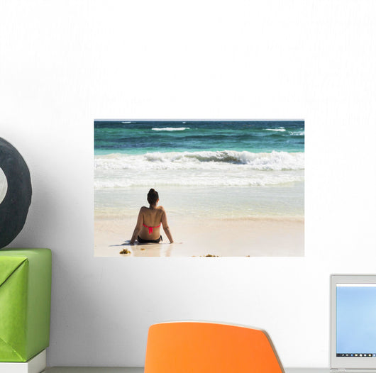Young Woman Sitting Sandy Wall Decal