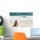 Young Woman Sitting Sandy Wall Decal