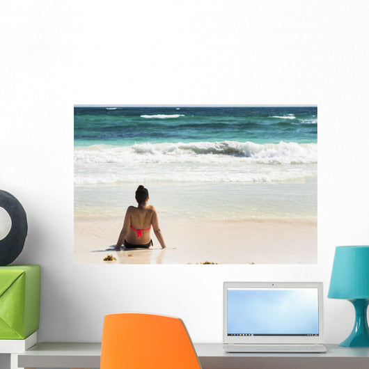 Young Woman Sitting Sandy Wall Decal