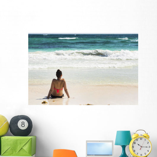 Young Woman Sitting Sandy Wall Decal