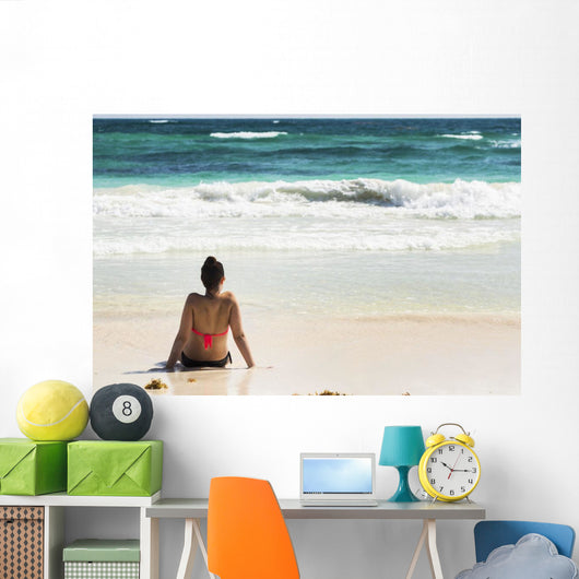 Young Woman Sitting Sandy Wall Decal