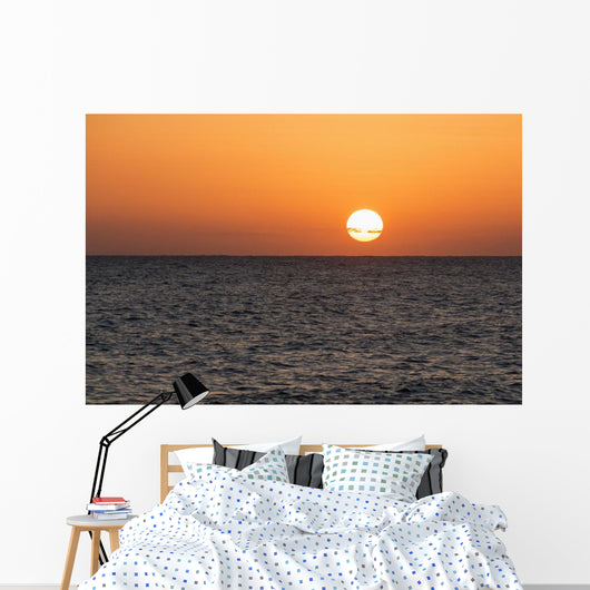 Glowing Sun over Ocean Wall Decal