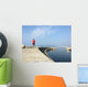 Man running along harbor sea wall Wall Mural