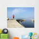 Man running along harbor sea wall Wall Mural