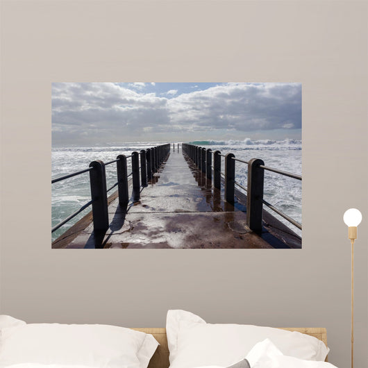 Beach Pier Waves ocean storm swells crashing water power Wall Mural