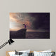 Woman in a storm Wall Mural