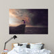 Woman in a storm Wall Mural