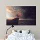 Woman in a storm Wall Mural