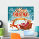 merry cheristmas with santa claus sled Wall Mural