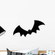 Bat Silhouette. A hand drawn vector silhouette illustration of a bat. Wall Decal
