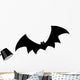 Bat Silhouette. A hand drawn vector silhouette illustration of a bat. Wall Decal