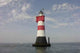 Red Sand Lighthouse Wall Mural
