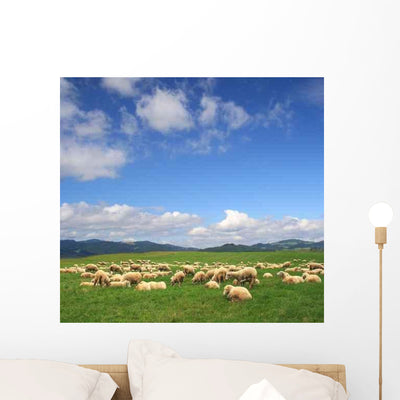 Summer Landscape with Herd Wall Mural shown on a wall