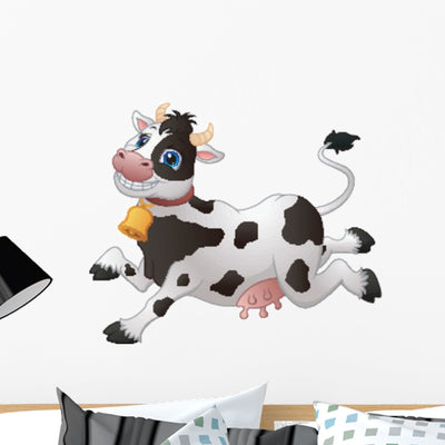 Happy Jumping Cartoon Cow Wall Decal shown on a wall