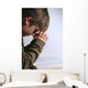 young boy praying over his bible Wall Mural