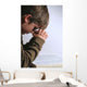 young boy praying over his bible Wall Mural