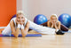 Group of people doing stretching exercise Wall Mural