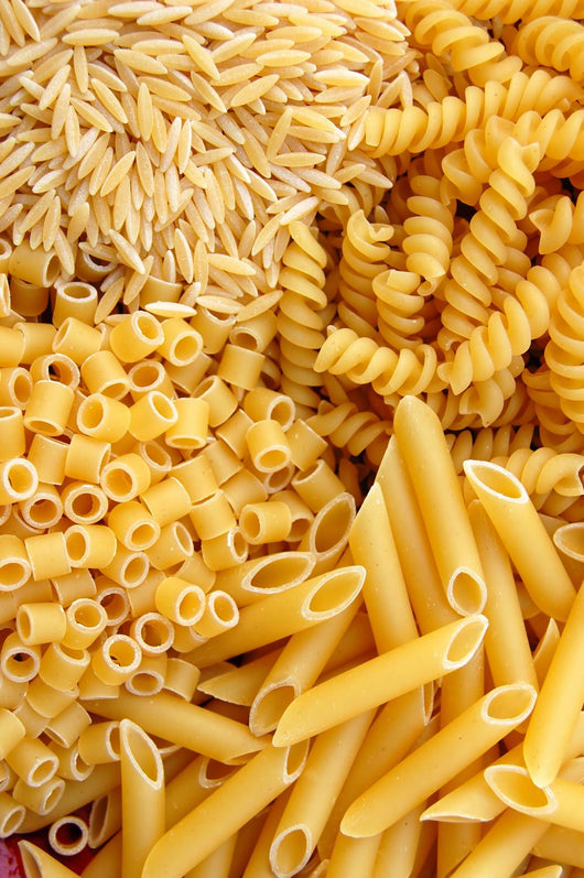 Four different kinds of italian pasta. Food background. Wall Mural
