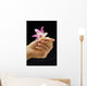 Female Hand Holding Flower Wall Mural