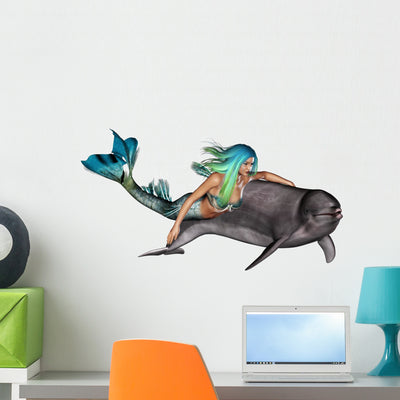Mermaid with Dolphin Wall Decal shown on a wall