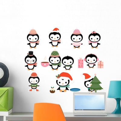 Cute Christmas Penguins Wall Decal Set shown on a wall