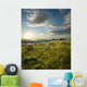 shepherd with dog and sheep grazing flowered field at sunrise Wall Mural