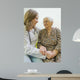 Old woman and yung doctor Wall Mural