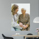 Old woman and yung doctor Wall Mural