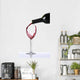 Red wine poured on glass Wall Decal