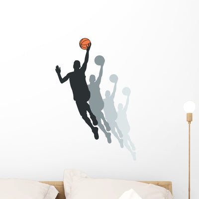 Basketball Layup Silhouette Wall Decal shown on a wall