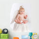 Adorable baby with angel wings on white Wall Decal