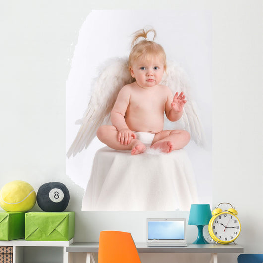 Adorable baby with angel wings on white Wall Decal