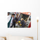 Paramedics and doctor unloading patient from ambulance Wall Mural