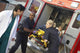 Paramedics and doctor unloading patient from ambulance Wall Mural