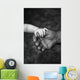 Baby's Hand Holding On To Adult Hand Wall Mural