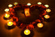 Heart with petals and candle lights Wall Mural