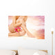 Female legs with pink lily over heaven background Wall Mural