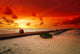 Romantic couple and sunset Wall Mural