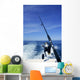 Fishing rod and reel on boat, fishing in blue ocean Wall Mural